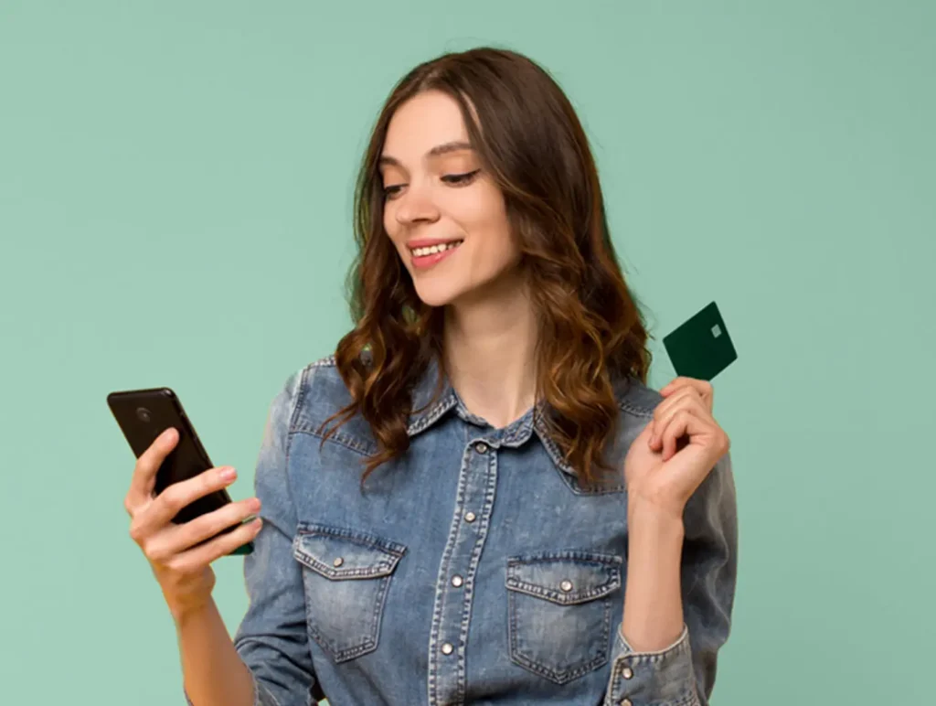 Woman holding a credit card